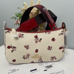 Coach crossbody bag with lady bug